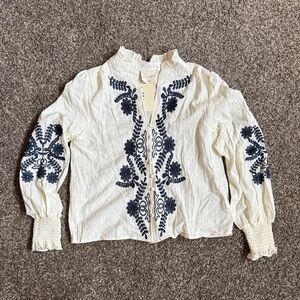 Chic White Top with Navy Floral Design